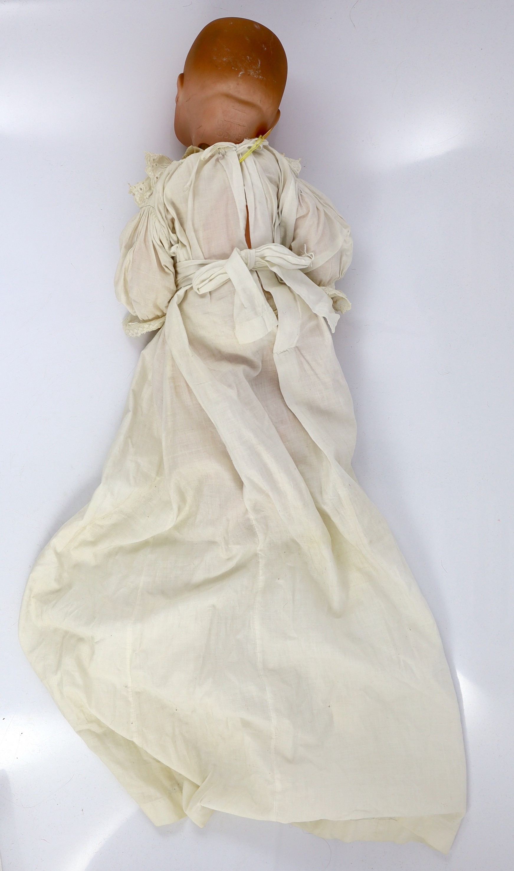 Two Armand Marseille bisque dolls, 23in. and 18in. resp.